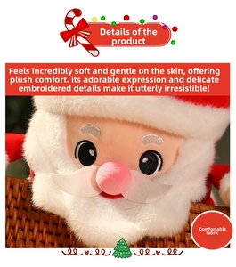 Close-up of Santa Claus plush toy with detailed embroidery and soft fabric texture
