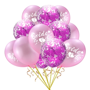 Détail de ballons Bride to Be roses avec paillettes et rubans dorés pour décoration mariage