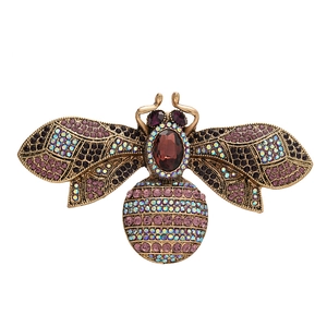 Vintage bronze honey bee brooch with purple gemstone and iridescent rhinestones in high detail