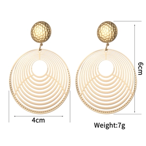 Detailed size view of gold openwork round earrings with 6cm height and 4cm width measurements
