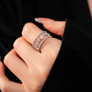 Double-layered North Star open ring with pavé zircons and beaded edges on wide band