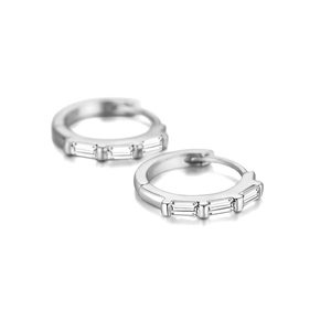 Detailed close-up of S925 silver wave earrings with rectangular zircon inlay and clip closure