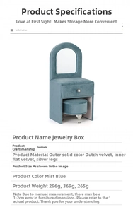 Detailed blue velvet sofa jewelry box with internal mirror and polished metal legs