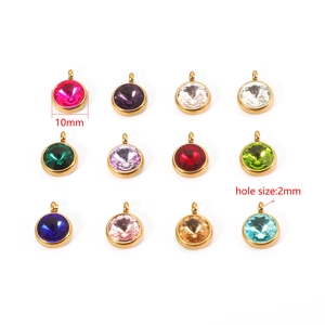 Close-up detail of 10mm colorful crystal birthstone charms with 2mm hole size specs