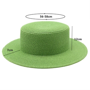Detail view of light green straw boater hat with dimensions: 12cm height and 7cm brim