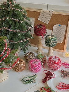 DIY Christmas tree mixed yarn balls in festive colors for holiday ribbon crafts