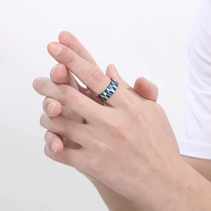 Men's titanium steel ring with blue water ripple texture on silver band worn on finger