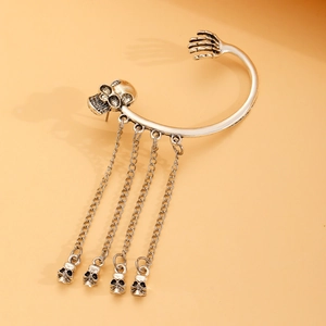 Gothic skull ear cuff in antique silver with bone hand design and dangling metal chains