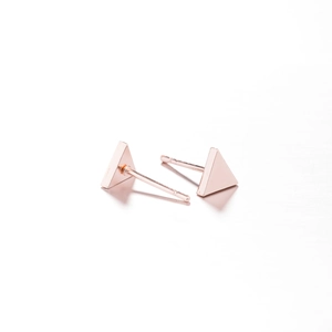 Polished rose gold triangle stud earrings in minimalist geometric style for women