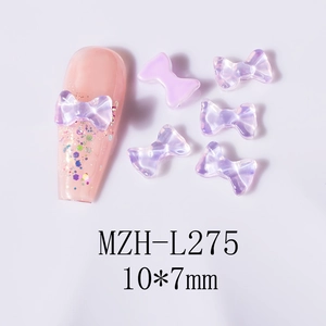 Macro shot of purple aurora 3D bow nail art charms with size detail 10x7mm