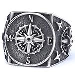 Detailed view of gothic style stainless steel compass ring with N E S W direction letters