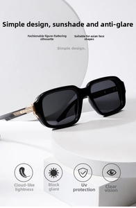 Detail of square pilot sunglasses with black frame and golden metal accents on temple