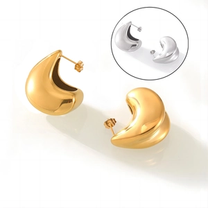Minimalist double-layered gold and silver teardrop stud earrings in polished stainless steel