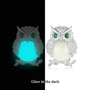 Luminous S925 sterling silver owl stud earrings glowing in the dark with green stone eyes