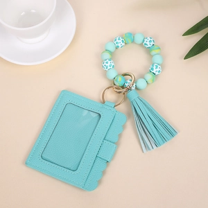 Mint green silicone beaded keychain bracelet with PU leather card holder and tassel
