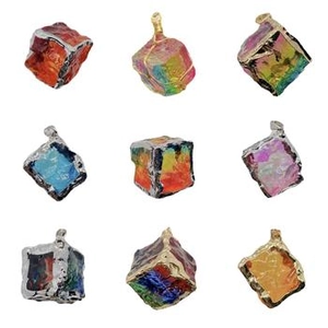 Macro detail of cube natural stone pendants with rainbow patterns and metal plating