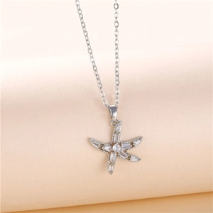 Silver starfish pendant necklace with sparkling cubic zirconia on a delicate chain