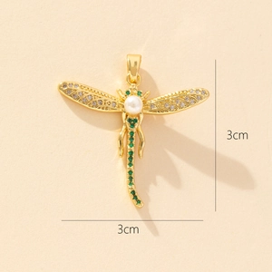 Detailed view of dragonfly pendant with colorful zircons and pearl measuring 3cm