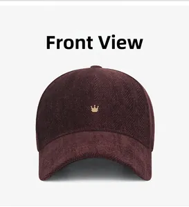 Front view detail of a burgundy herringbone baseball cap with a gold crown metal emblem