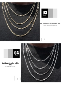 Layered gold and silver 3mm Figaro link chains in high-polish stainless steel