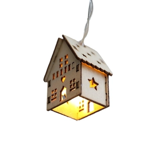 Wooden Christmas house fairy lights with warm LED glow and hollow heart-star cutouts