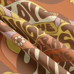 Detailed close-up of 70s retro psychedelic wall tapestry fabric with daisy pattern