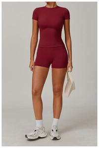Detailed view of burgundy high-waist short sleeve yoga set in high-elasticity fabric