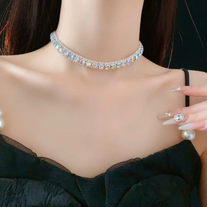 Macro view of sparkling silver rhinestone choker necklace on model's neck for elegant style
