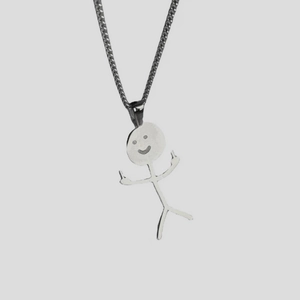 Close-up of funny silver matchstick man pendant necklace with rebellious gesture