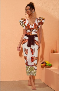 Detail of one-shoulder maple leaf print swimsuit with beaded straps and ruffled sleeve