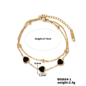 Detail view of double-layer gold heart bracelet with dimensions 17 plus 5cm and 3.4g weight