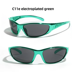 Detail view of model C11 sports sunglasses with metallic green frame and grey lenses