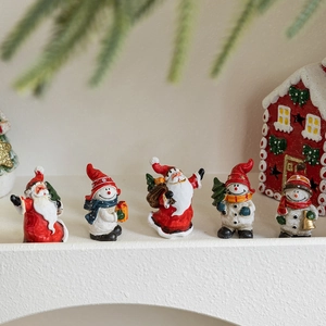 Set of 5 vintage resin Santa Claus and snowman figurines for Christmas tabletop decor