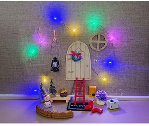 Miniature Christmas wooden door set with wreath, festive trees and LED lights for DIY decor