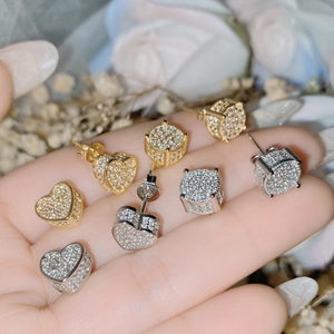 Micro paved heart and round geometric stud earrings in gold and silver finish