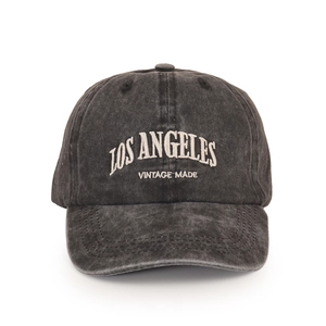 Detail of vintage washed grey baseball cap featuring Los Angeles white embroidery