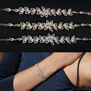 Elegant leaf charm bracelet with AAA cubic zirconia in rose gold, gold and silver finishes