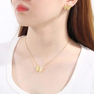 Elegant gold titanium steel butterfly necklace and earrings set with sparkling stones