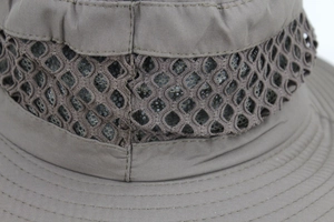 Close-up of breathable mesh design and reinforced stitching on a khaki sun hat