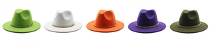 Row of colorful wide brim fedora hats with gold chain bands on white background