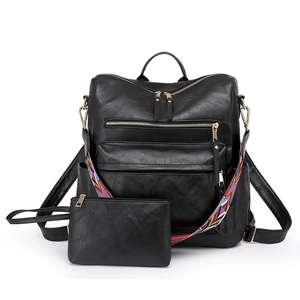 Detail of black PU leather backpack with colorful patterned strap and mini pouch