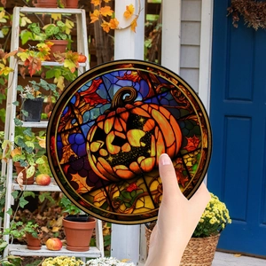 Detail of Halloween pumpkin acrylic ornament with stained glass effect for window decor