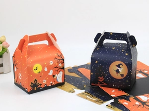 Halloween gift boxes with orange ghost and blue witch designs on a white background