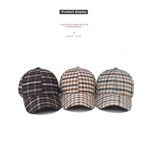 Detailed row of houndstooth baseball caps in brown, camel, and grey textured fabrics