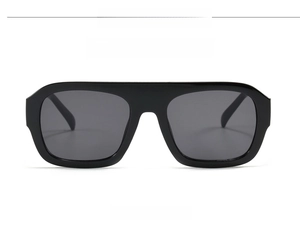 Detail view of model C01 oversized square sunglasses with black frame and dark lenses