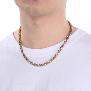 Golden titanium steel Cuban necklace with colorful enamel dots worn on model's neck