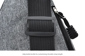 Detail view of adjustable buckle and durable zipper on a grey crossbody waist bag