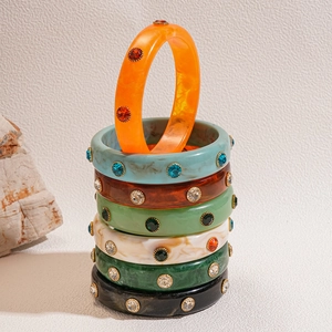 Stacked Bohemian colorful acrylic bangles with rhinestones in various vibrant hues