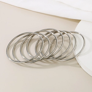 Set of seven 3mm minimalist silver titanium steel bangles with a polished mirror finish