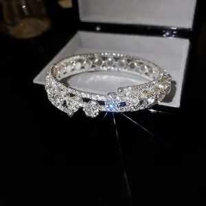 Luxurious multi-layer silver bangle with sparkling zircon flowers in a black jewelry box